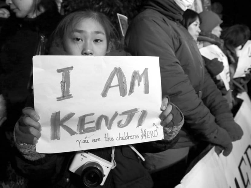 A girl at a vigil for Mr Kenji Goto in Tokyo on Wednesday. How the public reacts to the fate of Mr Goto could have a big influence on where things go from here. Photo: Reuters