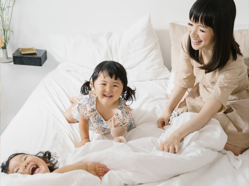 Tidying expert Marie Kondo, 39, with her two older children. Tidying expert Marie Kondo, 39, with her two older children.