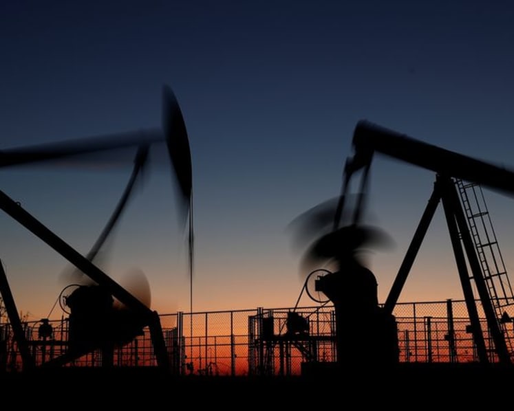 Oil holds steady at multi-week high as Russia limits fuel exports, US GDP revised up