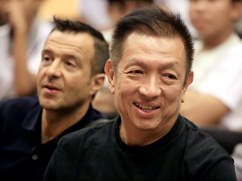 Mr Peter Lim (pictured in front), 69, has filed two police reports on June 20 and Aug 2, 2022 about people impersonating him online. Mr Peter Lim (pictured in front), 69, has filed two police reports on June 20 and Aug 2, 2022 about people impersonating him online.