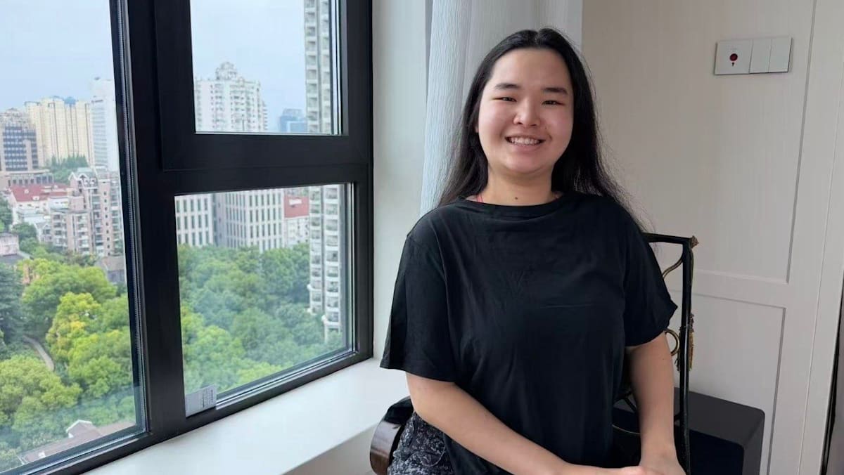 Born with hearing loss, she earned a musical theatre degree