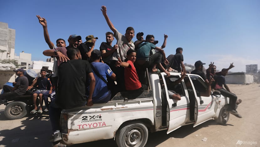 Some Palestinians pack up and move toward their homes in Gaza after ceasefire