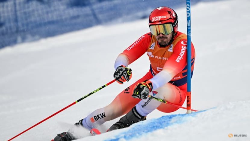 Alpine skiing-Swiss trio sweep men's giant slalom in Val d'Isere