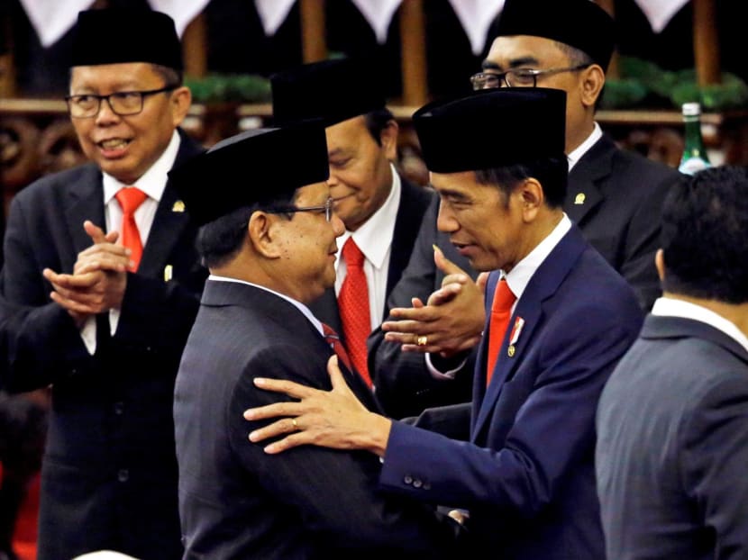 Indonesian President Joko Widodo is congratulated by the Mr Prabowo Subianto, who was his election rival, after his presidential inauguration for the second term, at the House of Representatives building in Jakarta, Indonesia on Oct 20, 2019. Indonesian President Joko Widodo is congratulated by the Mr Prabowo Subianto, who was his election rival, after his presidential inauguration for the second term, at the House of Representatives building in Jakarta, Indonesia on Oct 20, 2019.