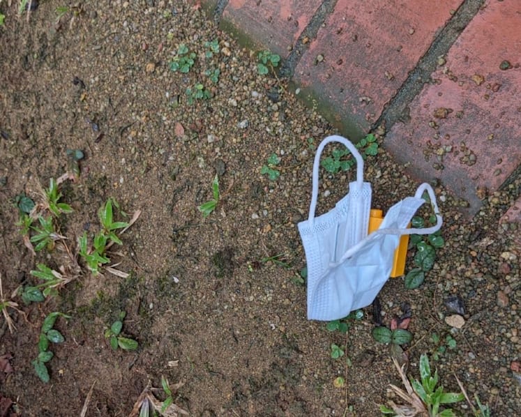 Explainer: How should face masks be properly disposed of, and can they be reused?