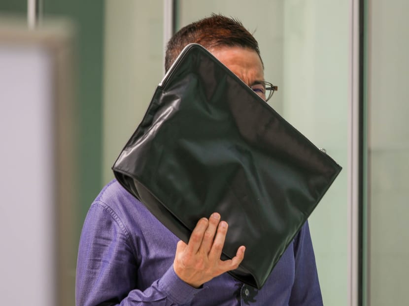 Leo Norman Chee Wei Kiong leaving the State Courts on June 9, 2021.