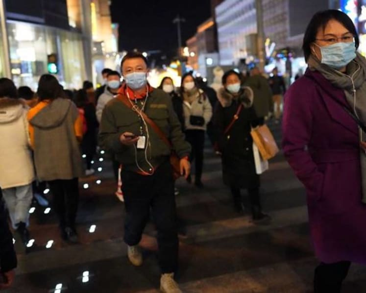 Beijing tells residents to stay put for Chinese New Year holidays due to COVID-19
