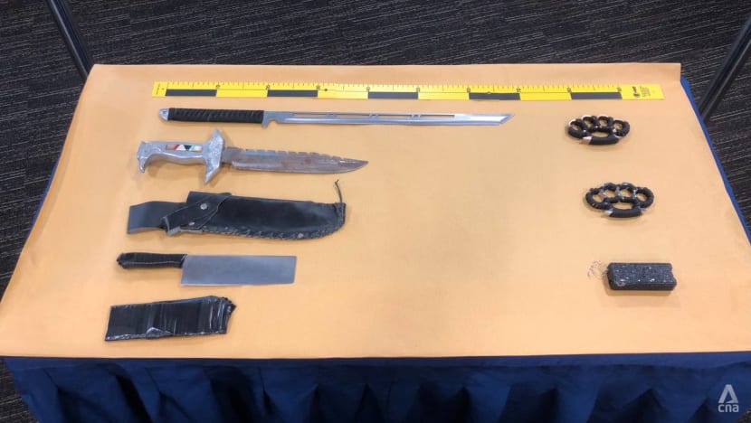 Man charged with attacking 2 police officers with stun device; samurai sword among weapons seized