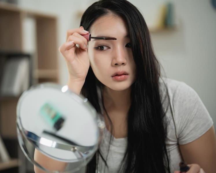 I tell my son he is perfect as he is – so what does he see when he looks at my bleached-blonde hair and makeup?