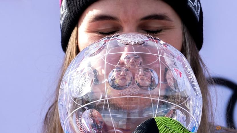 Alpine skiing-Pirovano takes World Cup downhill title with third win in a row