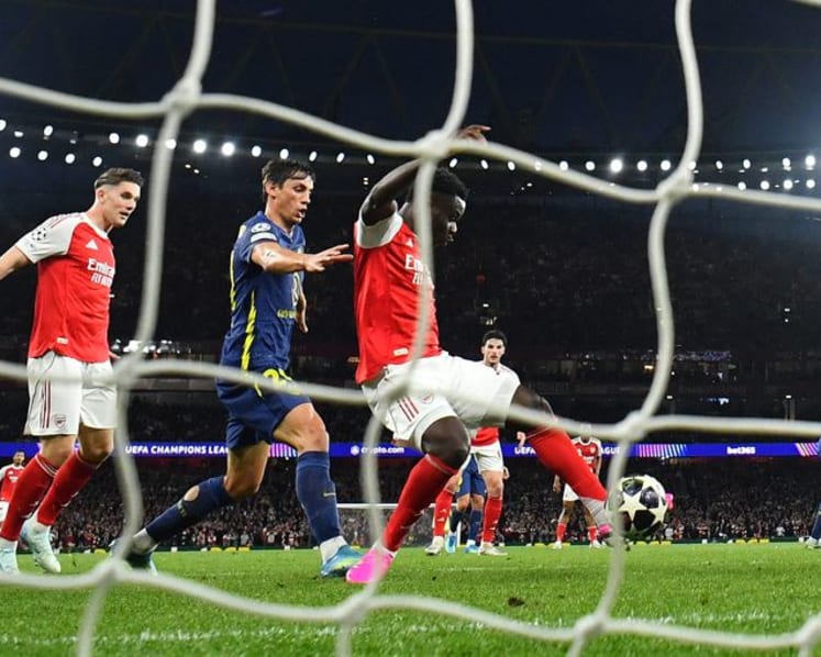 Saka sends Arsenal past Atletico into Champions League final