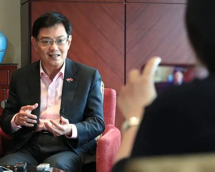 Singapore prepared for negative consequences of trade war: DPM Heng