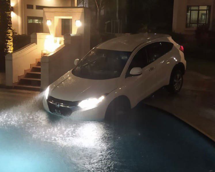 Gojek driver who steered car into Hillside condominium pool charged with rash act