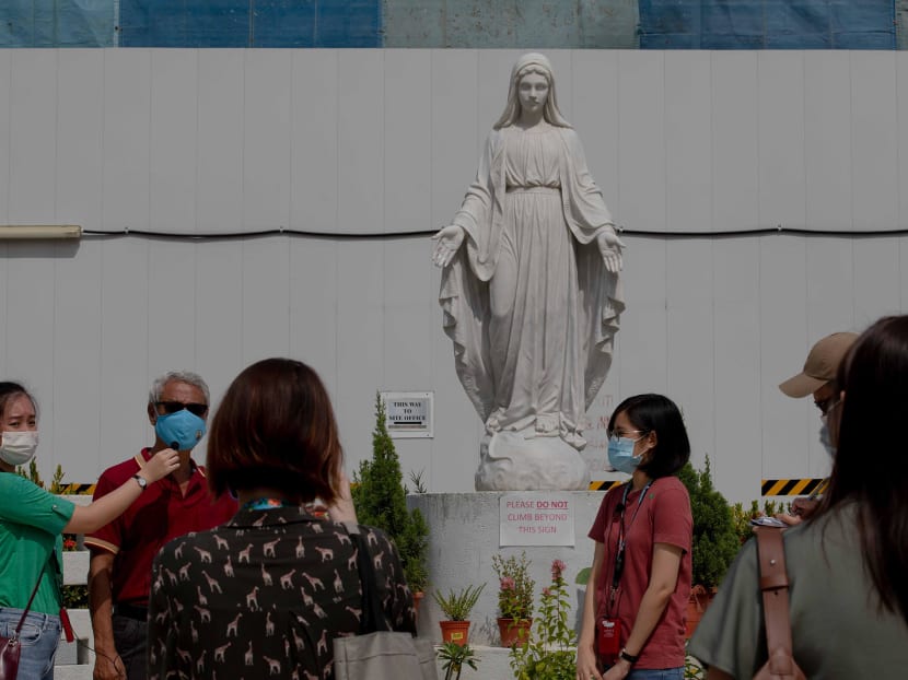 Visitors standing around the statue of Mary at the Church of the Nativity of the Blessed Virgin Mary at 1259 Upper Serangoon Road. Visitors standing around the statue of Mary at the Church of the Nativity of the Blessed Virgin Mary at 1259 Upper Serangoon Road.