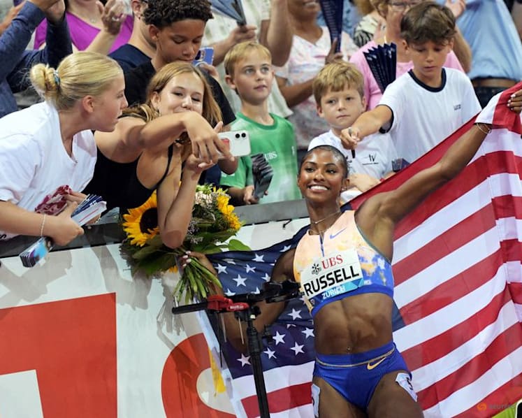 American hurdler Russell senses more to come after world record