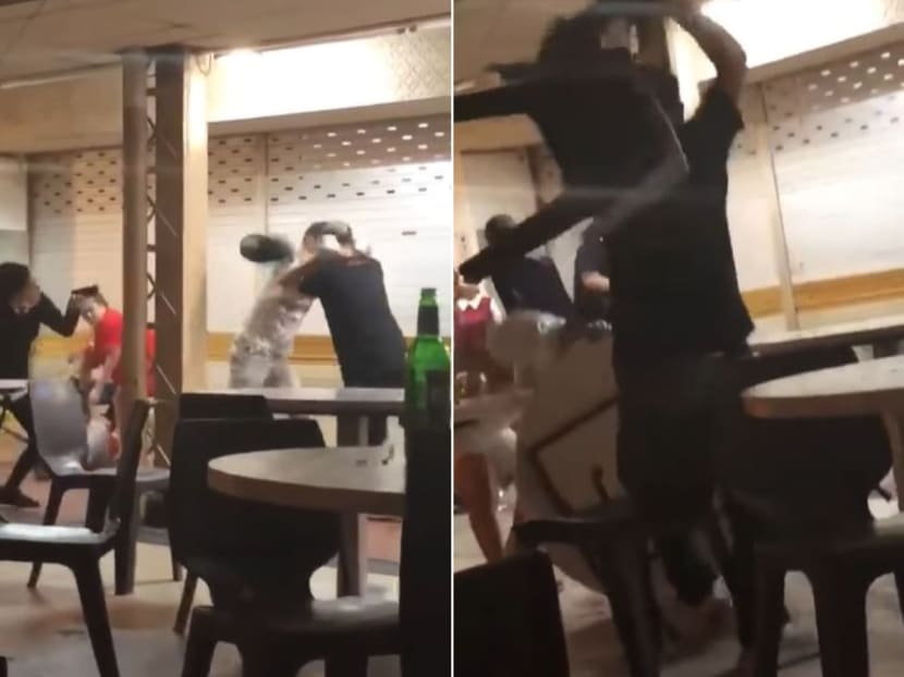 In a video of the incident posted on Facebook, several people can be seen scuffling with each other and shouting at a coffee shop. In a video of the incident posted on Facebook, several people can be seen scuffling with each other and shouting at a coffee shop.