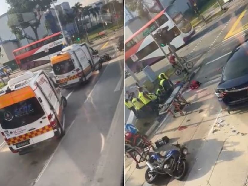 A screengrab from a video clip showing Singapore Civil Defence Force vehicles at the accident scene (left) and a number of emergency personnel attending to the two casualties.