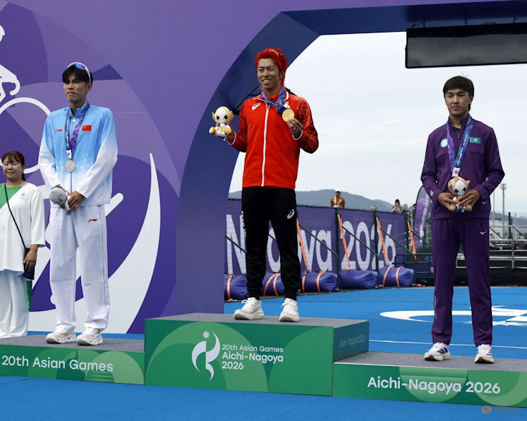 Japan triathlete Hojo wins first gold of Asian Games