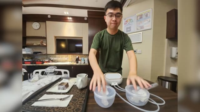 助术后妻子挤奶喂奶 男子获颁最可靠丈夫奖