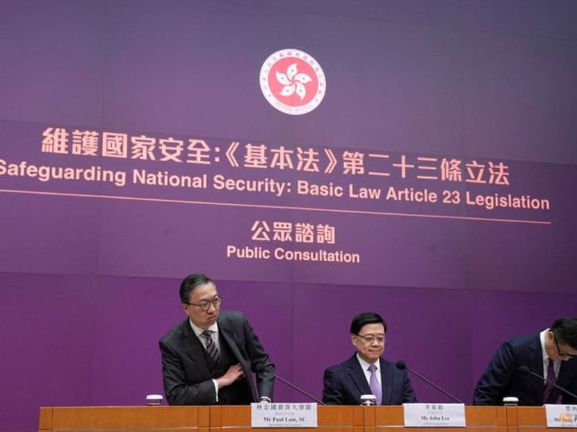 Hong Kong's Secretary for Justice Paul Lam, Chief Executive John Lee and Secretary for Security Chris Tang Ping-keung attend a press conference regarding the legislation of Article 23 national security laws, in Hong Kong, China on Jan 30, 2024. Hong Kong's Secretary for Justice Paul Lam, Chief Executive John Lee and Secretary for Security Chris Tang Ping-keung attend a press conference regarding the legislation of Article 23 national security laws, in Hong Kong, China on Jan 30, 2024.