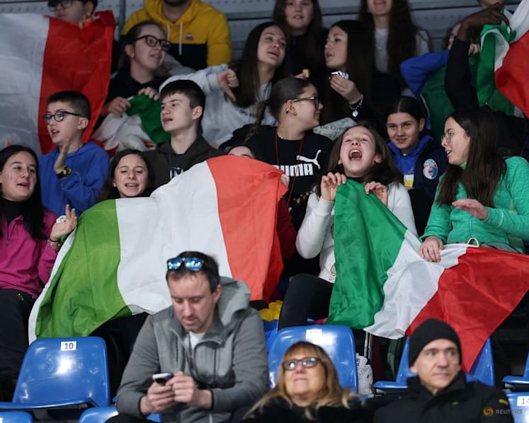 Curling-Curlers are loving the noisy fans at Winter Games
