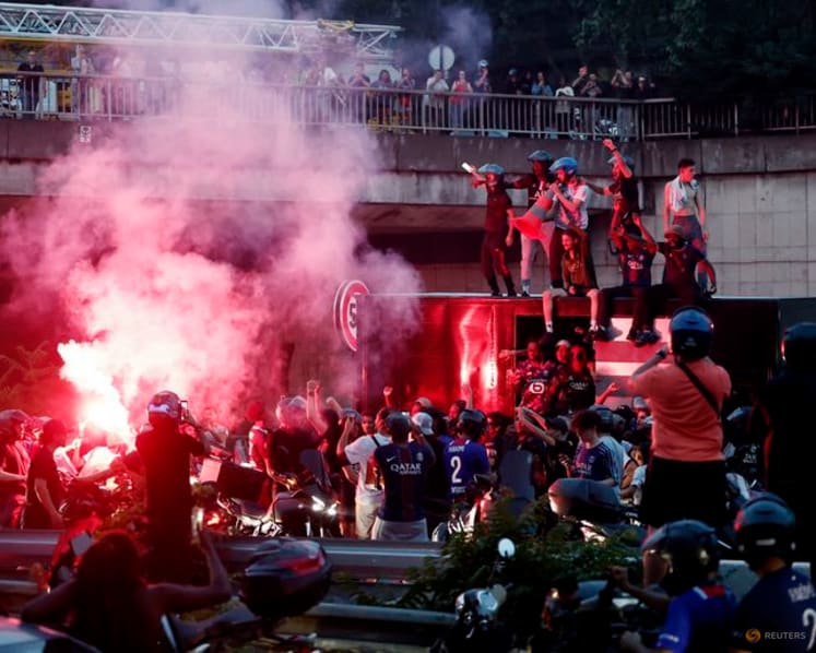 Jubilant PSG supporters spill onto Paris streets, some clashes with police