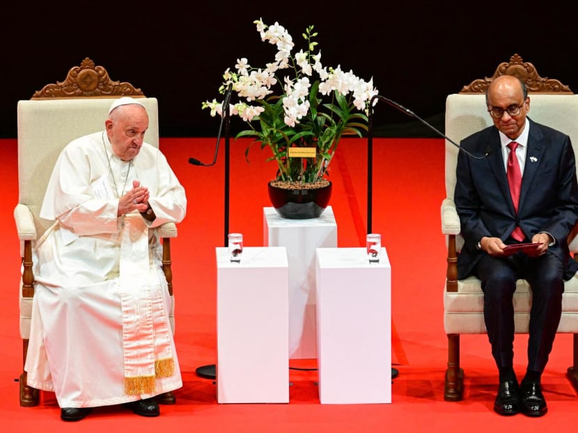 Pope Francis listens as President Tharman Shanmugaratnam speaks at the University Cultural Centre on Sept 12, 2024.
Pope Francis listens as President Tharman Shanmugaratnam speaks at the University Cultural Centre on Sept 12, 2024.
