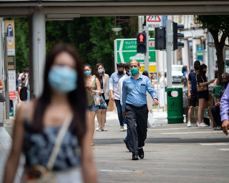 Singapore reports 10,594 new Covid-19 cases, 9 deaths