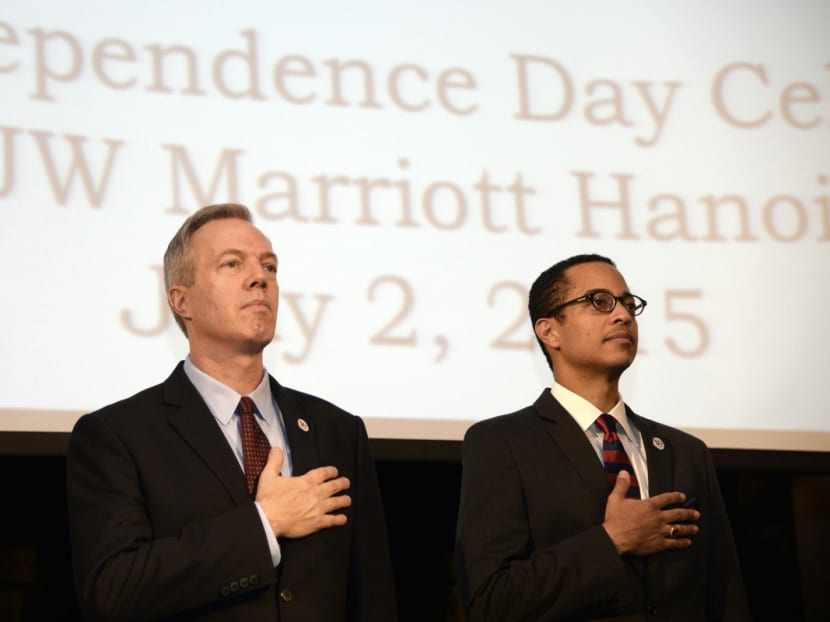 US Ambassador Ted Osius, left, and his husband Mr Clayton Bond. Photo: Bloomberg
