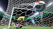 Munoz strike sends Colombia into World Cup Round of 32