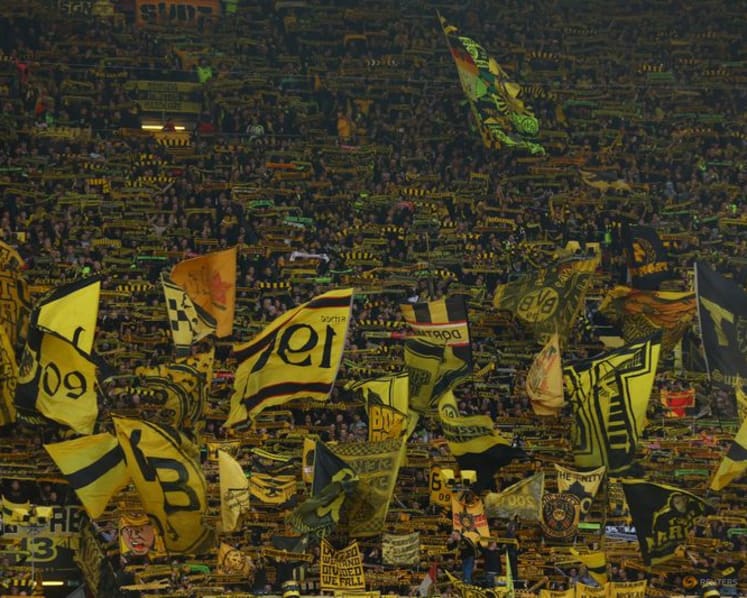 Dortmund waste two-goal lead but score stoppage-time win over St Pauli