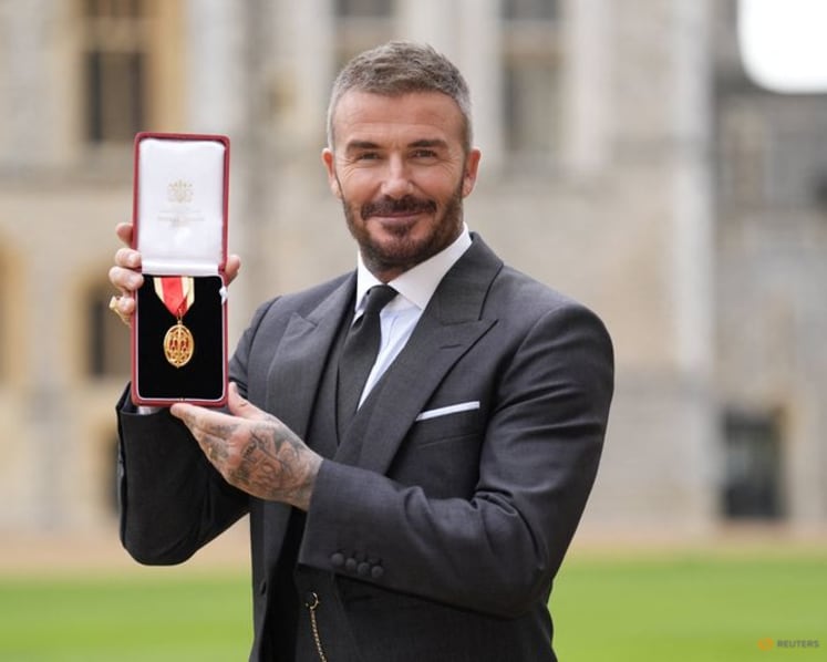 David Beckham knighted for services to sport and charity