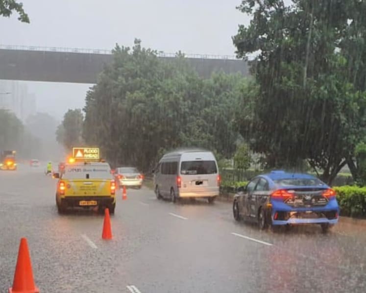 Flash floods at Punggol Way and KPE as heavy rain falls over many areas in Singapore