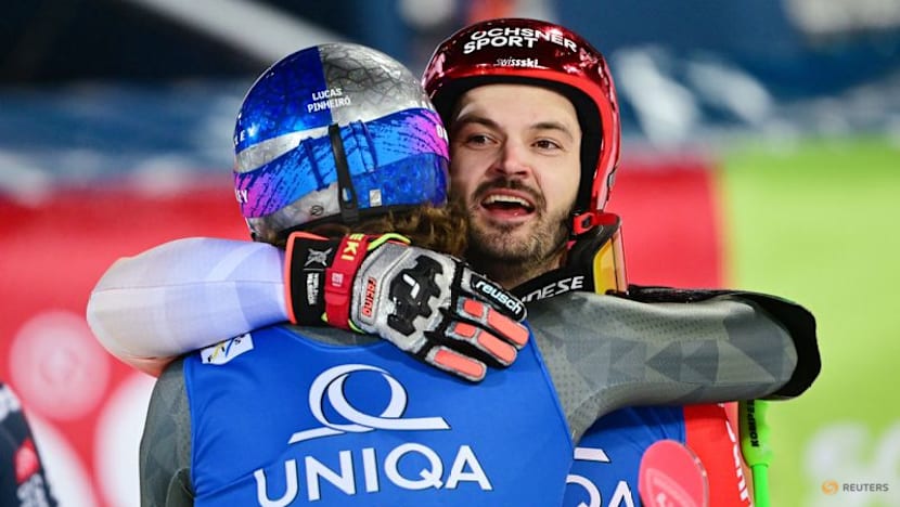 Alpine skiing-Swiss Meillard wins giant slalom under Schladming lights
