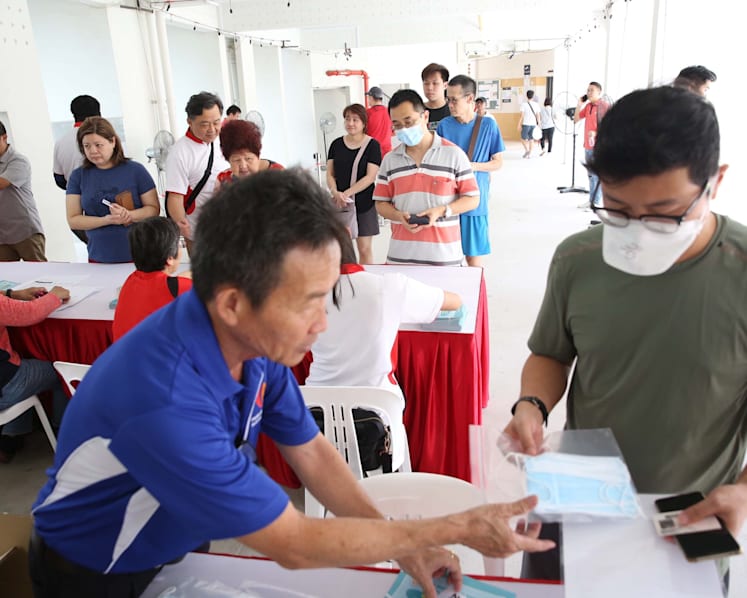 First day of free mask distribution sees orderly proceedings and minimal queues
