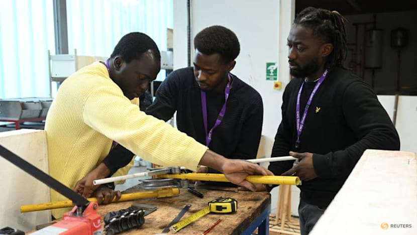 Fearing AI job losses, some young workers in Britain shift towards skilled trades