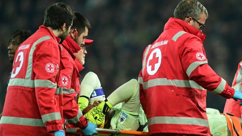 Injured Maignan to return to Milan after overnight hospital stay