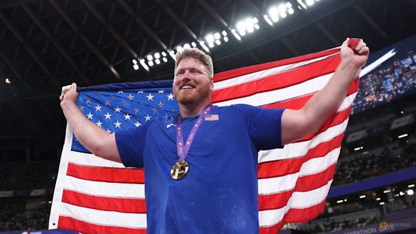 Injury-ravaged Crouser wins astounding third shot gold