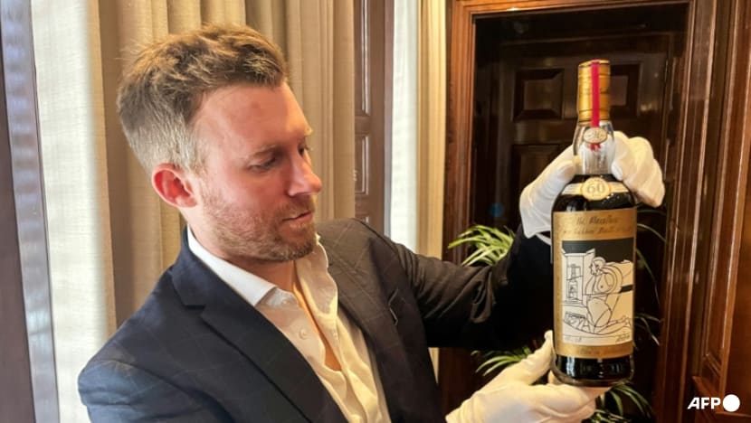 Cheers! Bottle of Scotch whisky sells for a record US$2.7 million at auction
