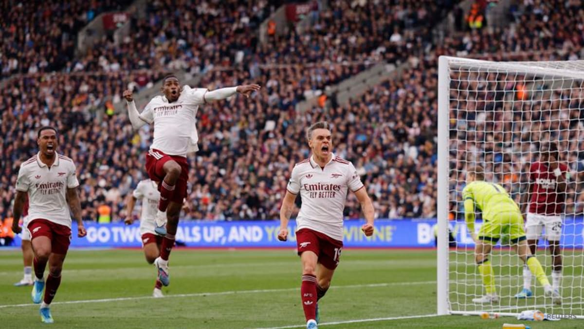 Arsenal survive huge scare to edge towards title
