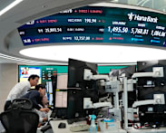 Asian stocks rally, crude drops on lingering hope for a peace deal