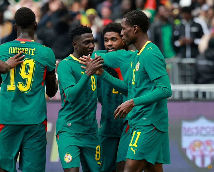 Defiant Senegal display Afcon trophy before beating Peru in friendly