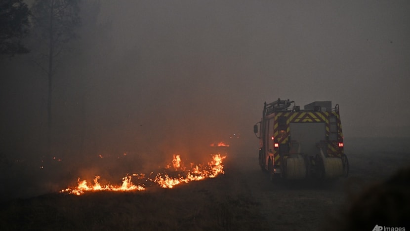 France, Spain race to contain 'monster' fires ahead of new heatwave