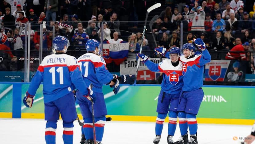 Ice hockey-Slovakia muscle past Germany into semi-finals