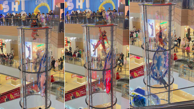 中国男童悬吊商场半空 消防员单手施救获网赞