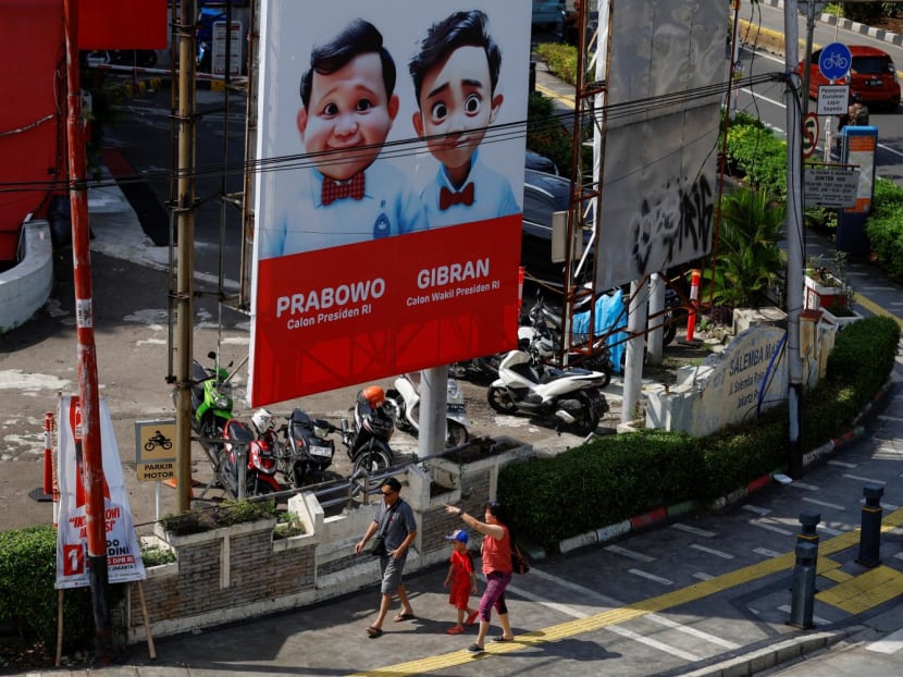 People walk past a billboard promoting Indonesia's Defence Minister and Presidential candidate Prabowo Subianto and his running mate Gibran Rakabuming Raka ahead of the upcoming general election in Jakarta, Indonesia on Jan 12, 2024. People walk past a billboard promoting Indonesia's Defence Minister and Presidential candidate Prabowo Subianto and his running mate Gibran Rakabuming Raka ahead of the upcoming general election in Jakarta, Indonesia on Jan 12, 2024.