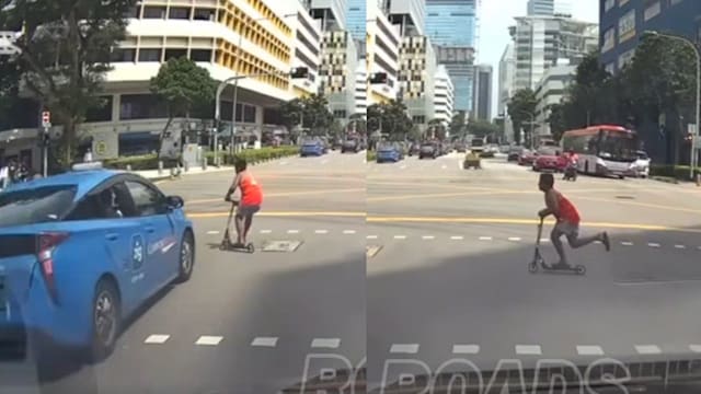 九岁男童踩滑板车闯红灯 被德士撞飞