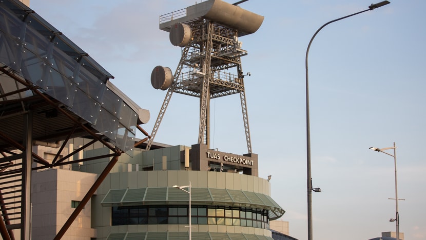 Lorry driver charged with helping fugitive flee Singapore after he allegedly failed to deliver luxury goods