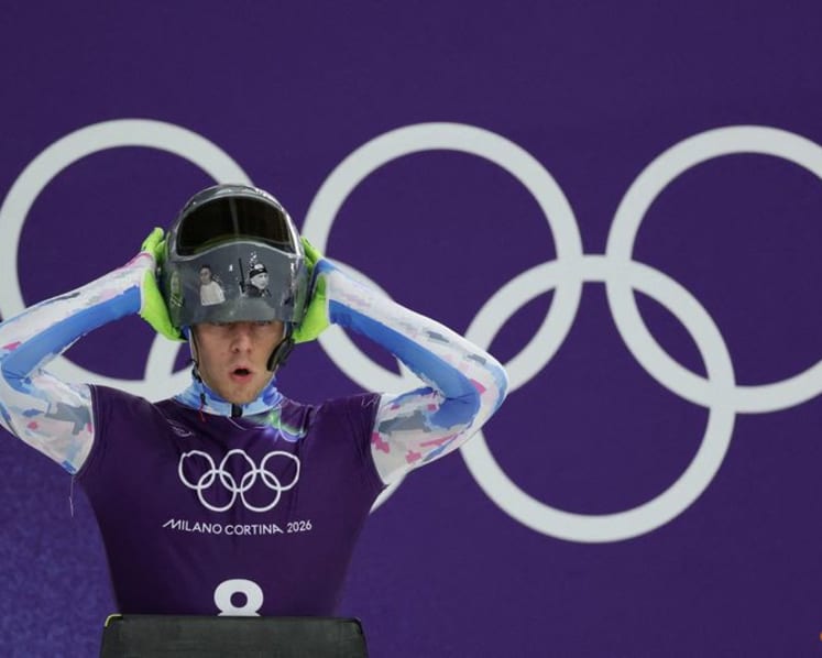 IOC 'begs' defiant Ukrainian to race without war dead helmet