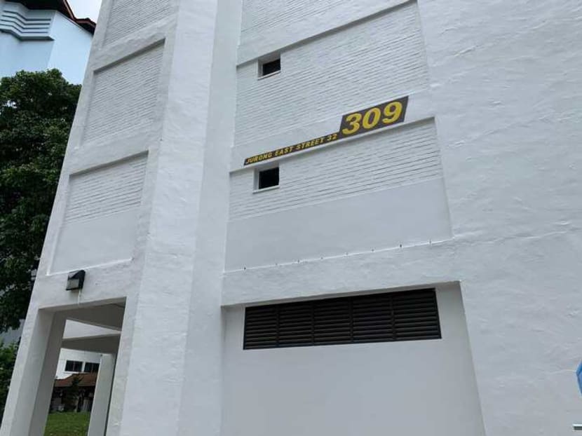Residents of Block 309 in Jurong East Street 32 heard a commotion before seeing a 34-year-old woman covered in blood at the foot of neighbouring Block 308. Residents of Block 309 in Jurong East Street 32 heard a commotion before seeing a 34-year-old woman covered in blood at the foot of neighbouring Block 308.